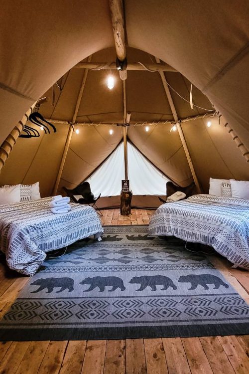 The interior of a tipi at Bodhi Farms, one of the best places to go glamping in Montana